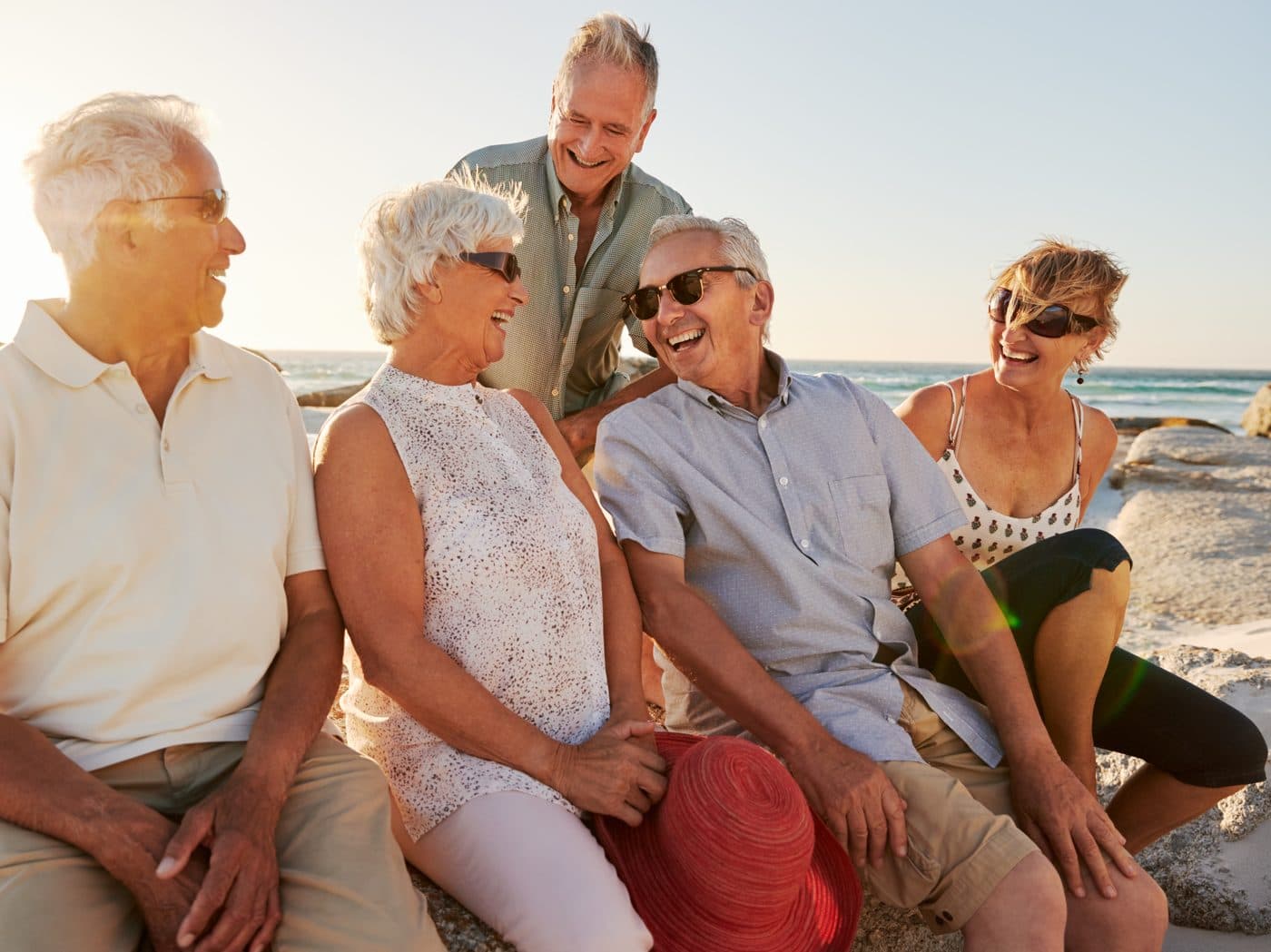 Two women having a supportive conversation about choosing a breast augmentation surgeon