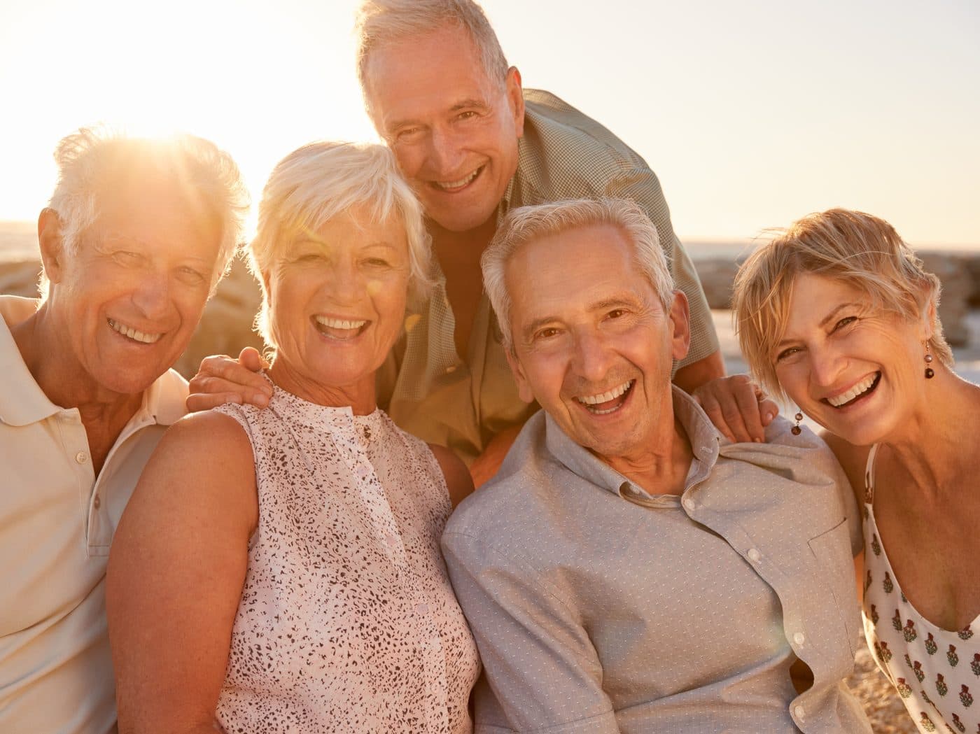Two women discussing breast implant options over coffee in an Australian cafe