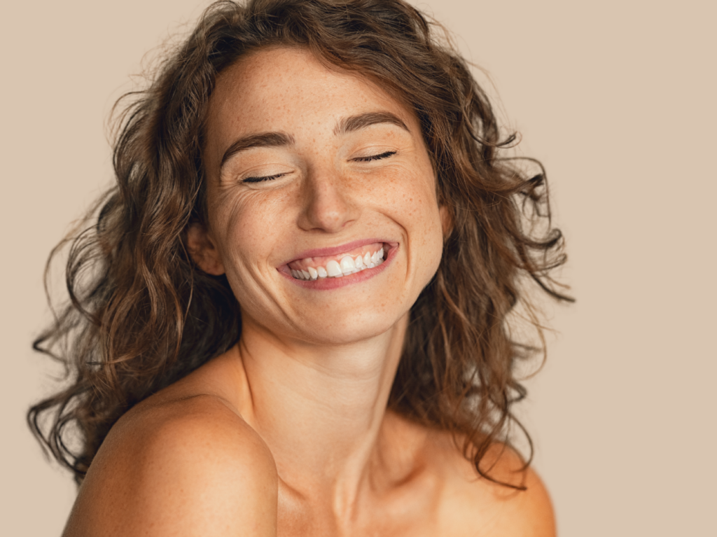 Woman Happy Eyes Closed with Pale Beige Background